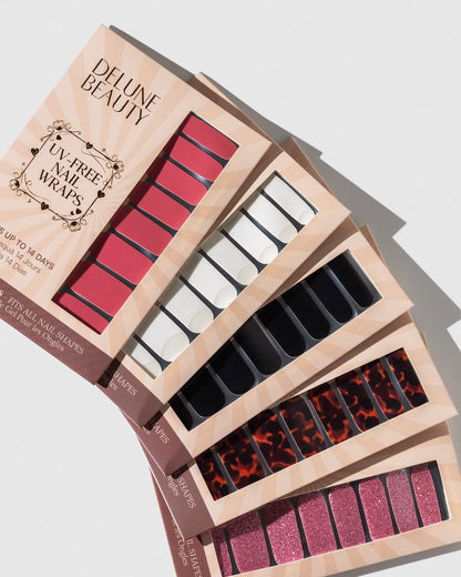 Tortoiseshell (neglefolier uden UV): vifte af Delunes neglefolier uden UV i rødt, hvidt, sort, skildpaddemønster og lyserød glitter